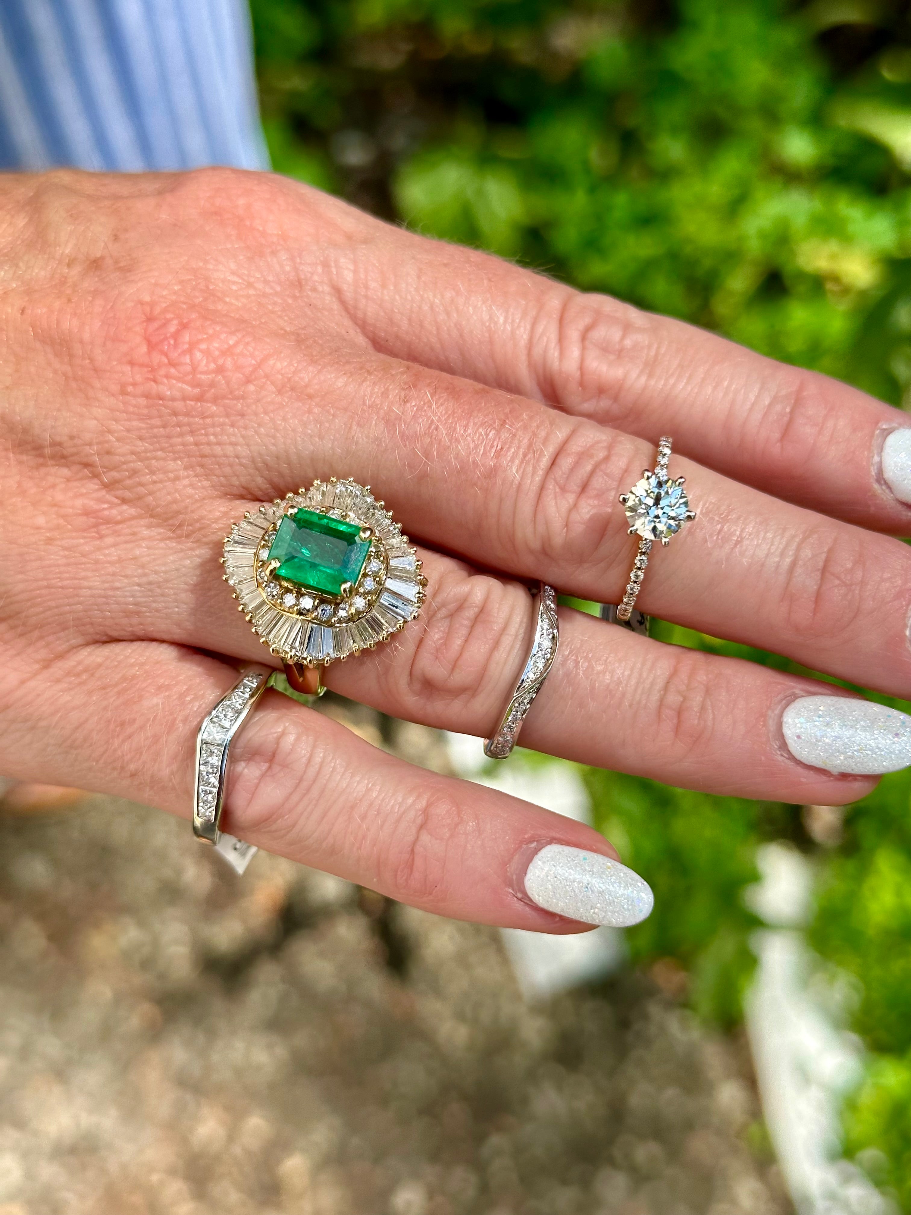 Yellow Gold Emerald-cut Emerald with Diamond Halo Ring